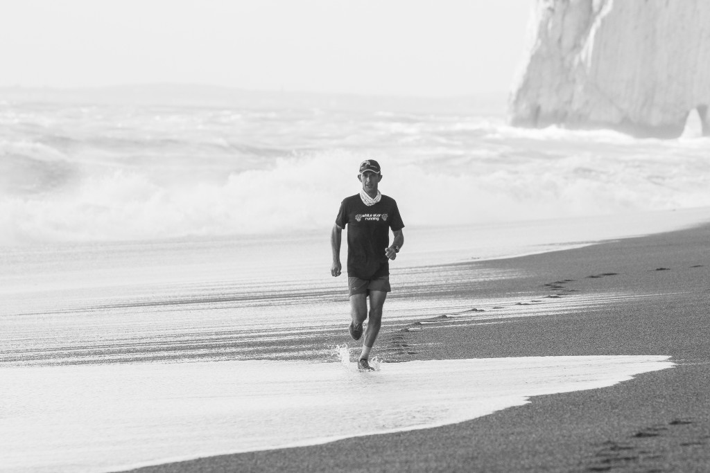 Dan Williams running at Durdle Door Beach